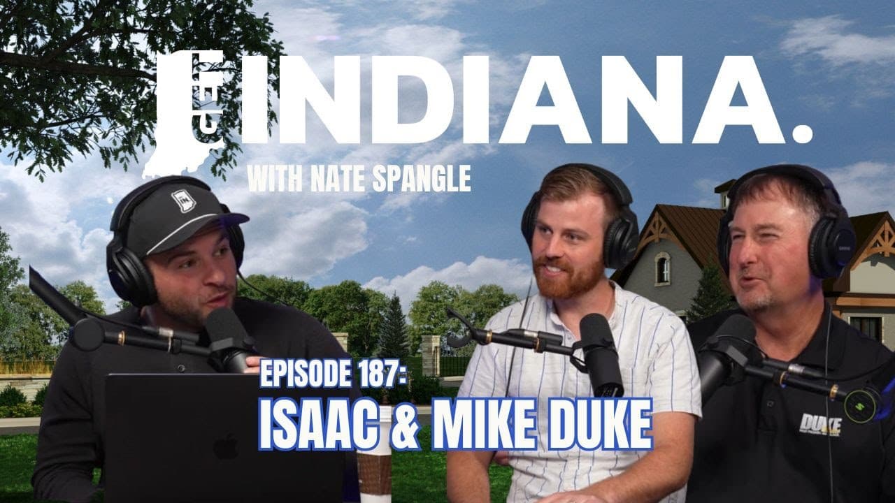 Podcast hosts discuss Indiana's first wellness lifestyle community, with a scenic backdrop of greenery and homes.