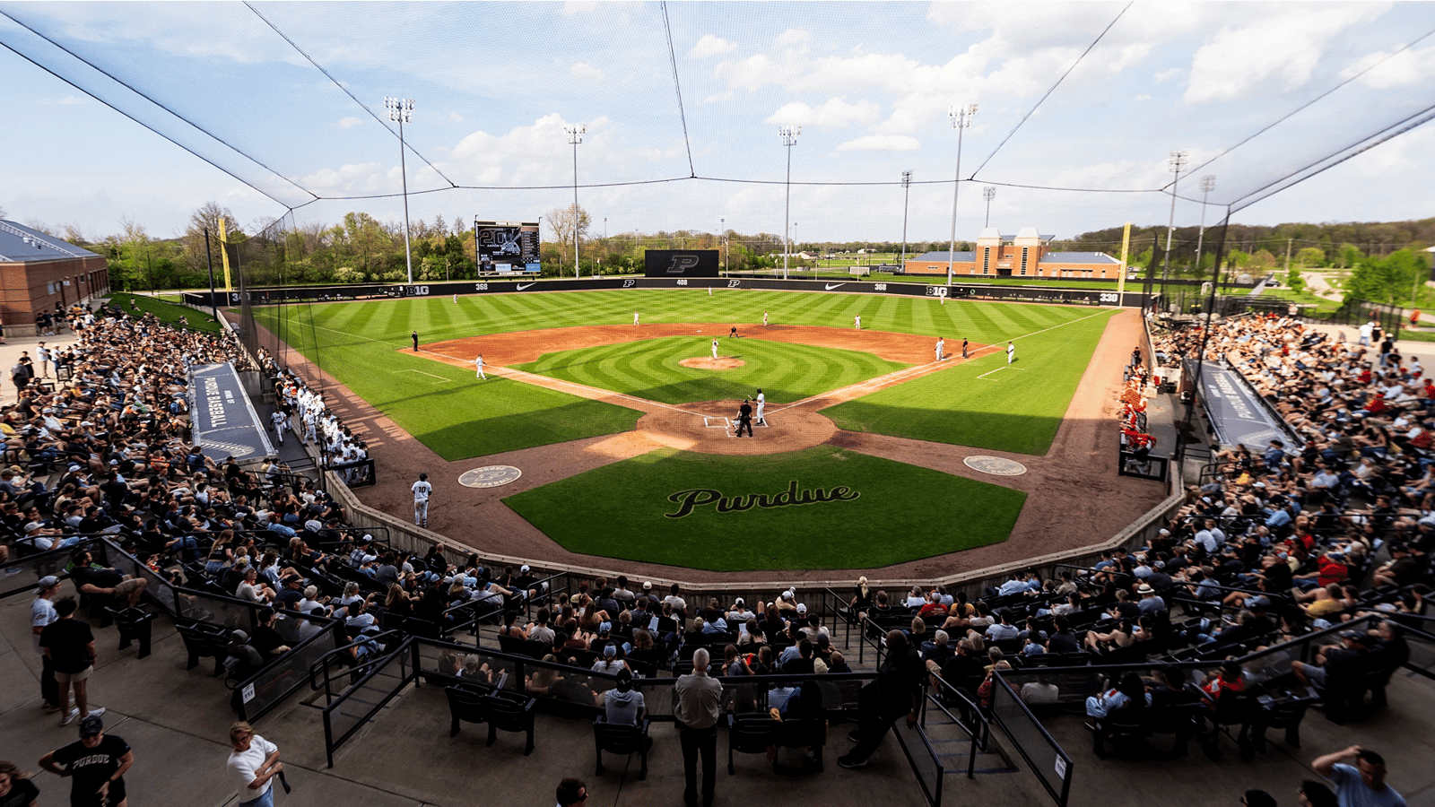 Purdue University Baseball Field on a Sunny Day with Fans Watching