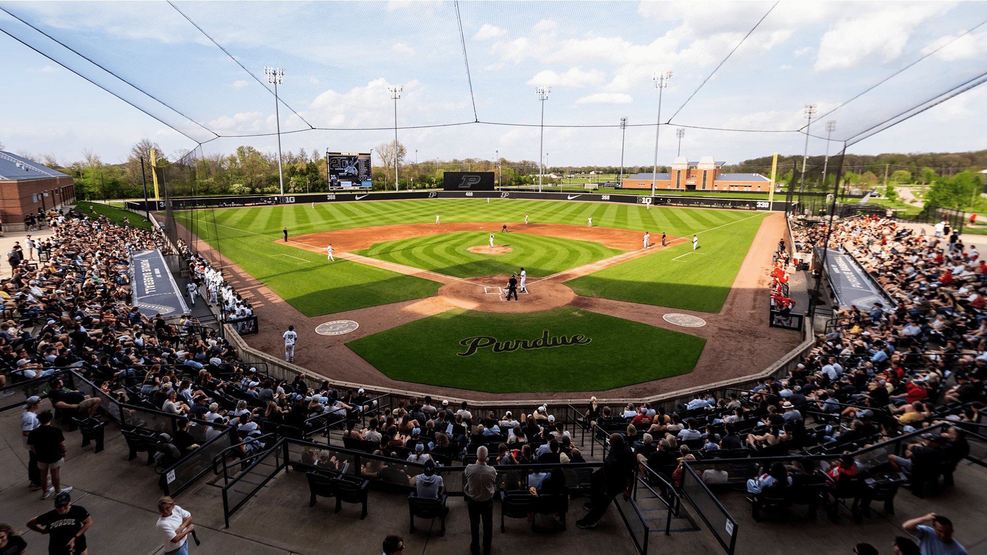 Purdue University Baseball Field on a Sunny Day with Fans Watching